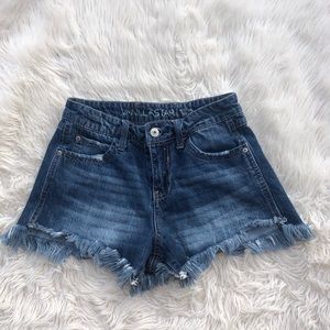 High waisted distressed jean shorts